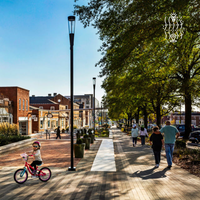 The redevelopment of Downtown Kannapolis tells the story of the city's textile past while setting course for a bold future. The master plan and design respects the integrity of the historic downtown by preserving landmark buildings and an iconic row of mature oak trees while overlaying public art and placemaking to create an authentic experience for this multi-generational community. #PlacesThatMatter #DrivenByStory