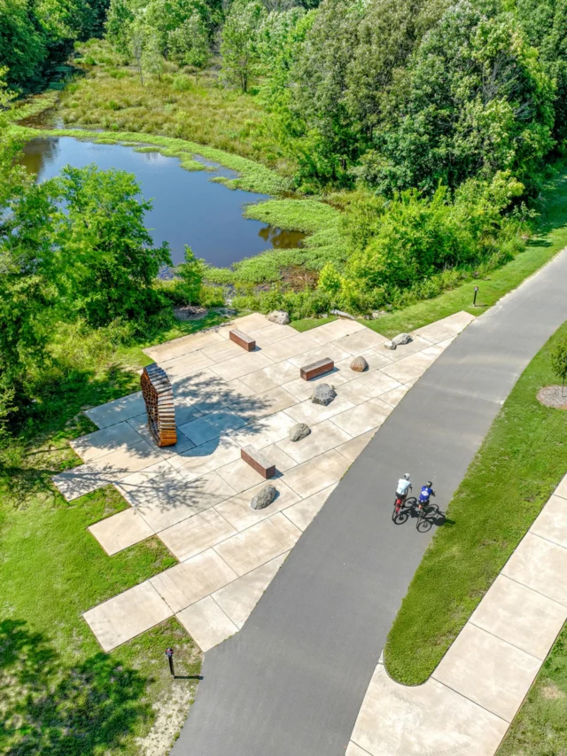 Extending Little Sugar Creek Greenway south meant navigating wetlands, existing development, and complex roadway conditions while creating a route that feels connected to its surroundings.

Along this 2.5-mile extension, Marsh Park introduces overlooks, seating, public art, and naturalized plantings that invite visitors to slow down and experience the wetland landscape more closely. It’s a moment of respite within the larger greenway journey, giving visitors a reason to pause along the way.